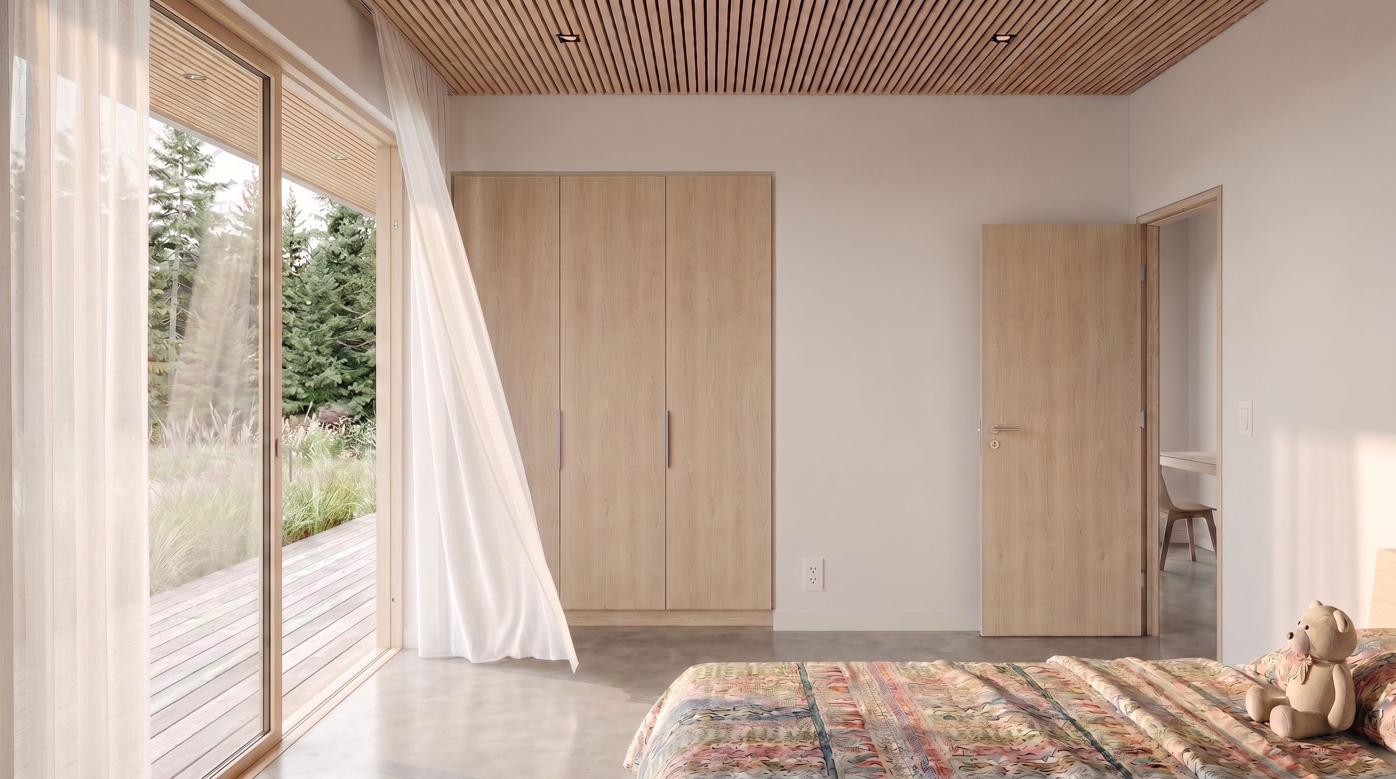 A modern bedroom interior featuring light wood furniture, including a tall wardrobe, a door, and a slatted wood ceiling, with a bed and patterned rug in the foreground and a large window looking out to trees.